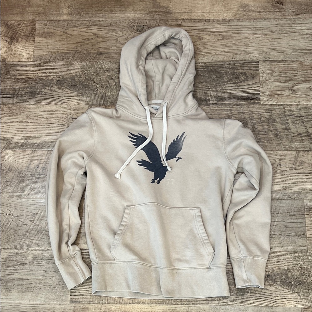 American Eagle Outfitters Cream Hoodie with Eagle Graphic